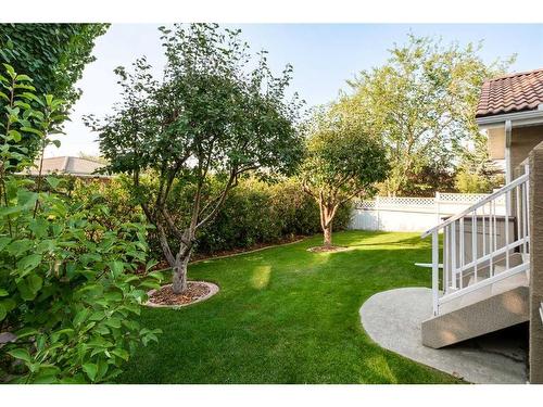 244 Country Hills Court Nw, Calgary, AB - Outdoor With Backyard