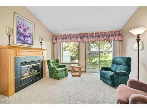 45 Somervale Point Sw, Calgary, AB - Indoor Photo Showing Living Room With Fireplace