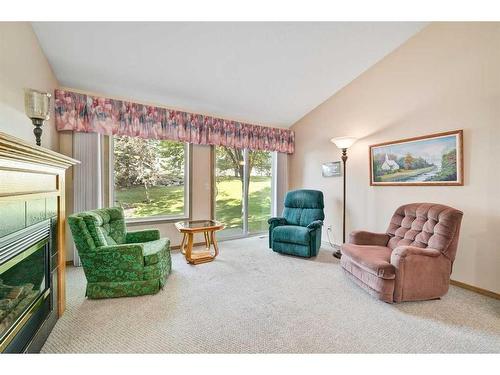 45 Somervale Point Sw, Calgary, AB - Indoor Photo Showing Living Room With Fireplace