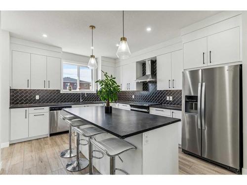 250 Chelsea Place, Chestermere, AB - Indoor Photo Showing Kitchen With Stainless Steel Kitchen With Upgraded Kitchen