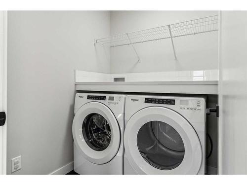 250 Chelsea Place, Chestermere, AB - Indoor Photo Showing Laundry Room