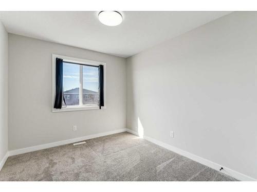 250 Chelsea Place, Chestermere, AB - Indoor Photo Showing Other Room