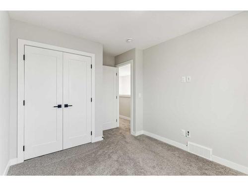 250 Chelsea Place, Chestermere, AB - Indoor Photo Showing Other Room