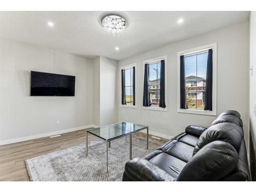 250 Chelsea Place, Chestermere, AB - Indoor Photo Showing Living Room