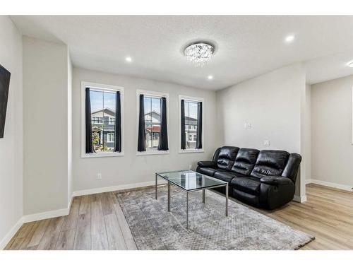 250 Chelsea Place, Chestermere, AB - Indoor Photo Showing Living Room