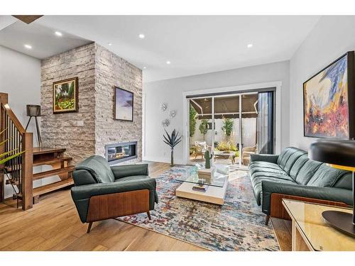 724 36 Street Nw, Calgary, AB - Indoor Photo Showing Living Room With Fireplace