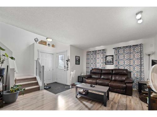 133 Covepark Crescent Ne, Calgary, AB - Indoor Photo Showing Living Room