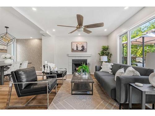 9137 21 Street Se, Calgary, AB - Indoor Photo Showing Living Room With Fireplace