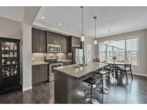 32 Saddlelake Terrace Ne, Calgary, AB - Indoor Photo Showing Kitchen With Stainless Steel Kitchen With Double Sink With Upgraded Kitchen