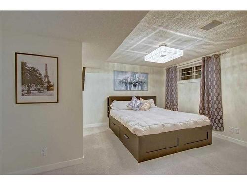 15479 Mckenzie Lake Way Se, Calgary, AB - Indoor Photo Showing Bedroom