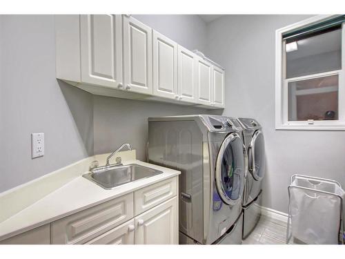 15479 Mckenzie Lake Way Se, Calgary, AB - Indoor Photo Showing Laundry Room