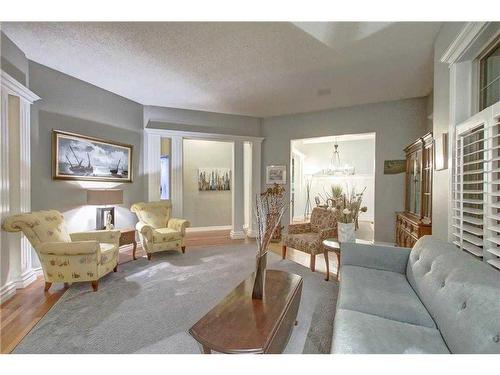 15479 Mckenzie Lake Way Se, Calgary, AB - Indoor Photo Showing Living Room