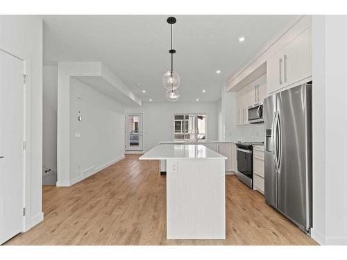 2002-280 Chelsea Road, Chestermere, AB - Indoor Photo Showing Kitchen With Upgraded Kitchen