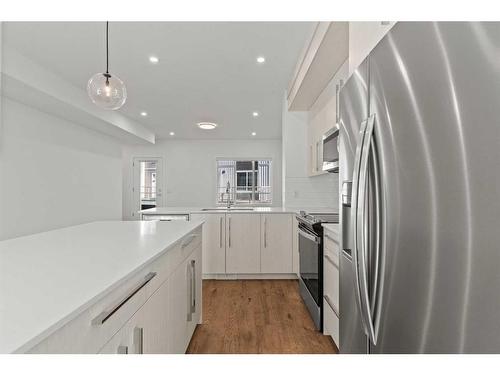 2002-280 Chelsea Road, Chestermere, AB - Indoor Photo Showing Kitchen With Upgraded Kitchen