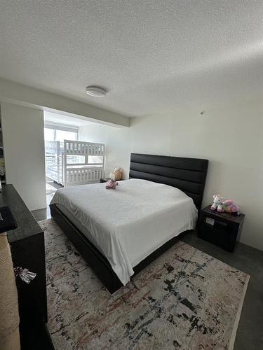 1802-188 15 Avenue Sw, Calgary, AB - Indoor Photo Showing Bedroom