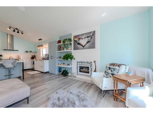 52 Martinridge Way Ne, Calgary, AB - Indoor Photo Showing Living Room With Fireplace