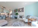 52 Martinridge Way Ne, Calgary, AB  - Indoor Photo Showing Living Room With Fireplace 