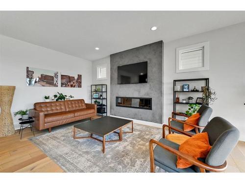 52 Seton Rise Se, Calgary, AB - Indoor Photo Showing Living Room With Fireplace