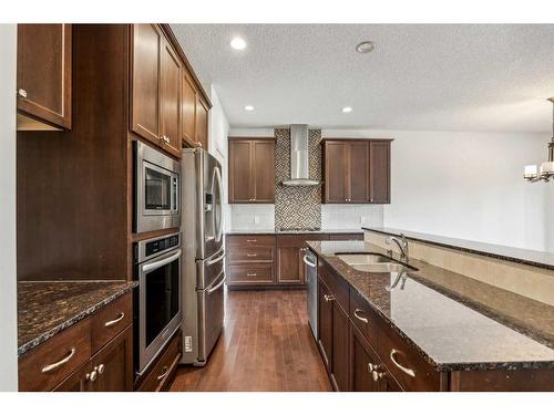 102 Cranarch Common Se, Calgary, AB - Indoor Photo Showing Kitchen With Double Sink With Upgraded Kitchen