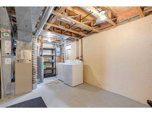 243 Berwick Drive Nw, Calgary, AB - Indoor Photo Showing Laundry Room