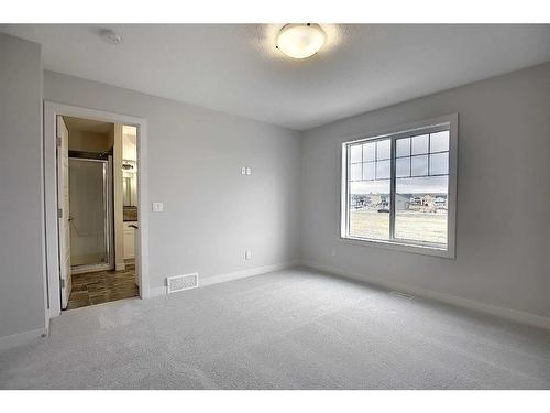 56 Shale Avenue, Cochrane, AB - Indoor Photo Showing Other Room