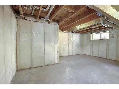 56 Shale Avenue, Cochrane, AB - Indoor Photo Showing Basement