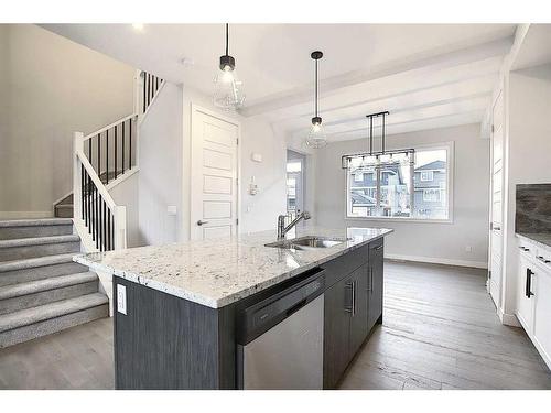 56 Shale Avenue, Cochrane, AB - Indoor Photo Showing Kitchen With Double Sink With Upgraded Kitchen