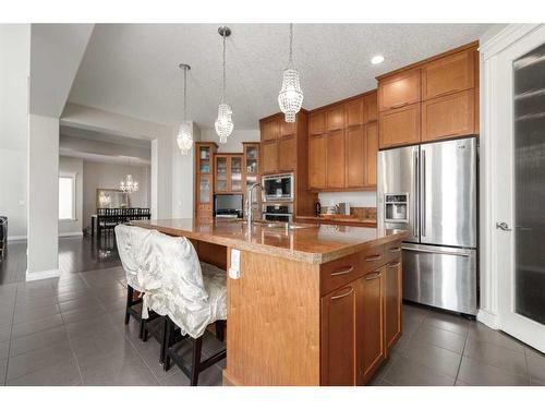 8 Spring Willow Place Sw, Calgary, AB - Indoor Photo Showing Kitchen With Stainless Steel Kitchen With Upgraded Kitchen