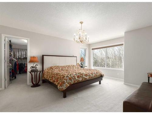 8 Spring Willow Place Sw, Calgary, AB - Indoor Photo Showing Bedroom