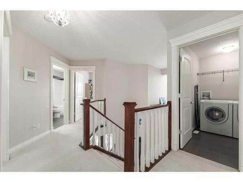 8 Spring Willow Place Sw, Calgary, AB - Indoor Photo Showing Laundry Room