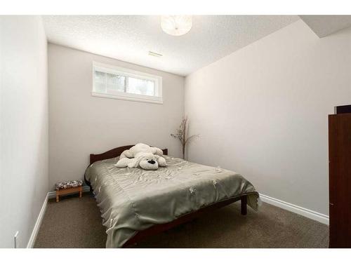 8 Spring Willow Place Sw, Calgary, AB - Indoor Photo Showing Bedroom