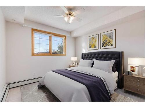 126-6868 Sierra Morena Boulevard Sw, Calgary, AB - Indoor Photo Showing Bedroom