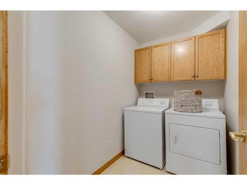 126-6868 Sierra Morena Boulevard Sw, Calgary, AB - Indoor Photo Showing Laundry Room