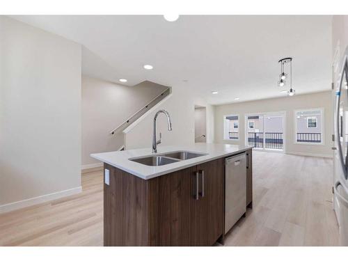 122 Corner Meadows Square Ne, Calgary, AB - Indoor Photo Showing Kitchen With Double Sink