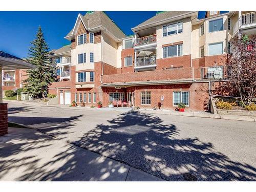 1301-1000 Sienna Park Green Sw, Calgary, AB - Outdoor With Balcony With Facade