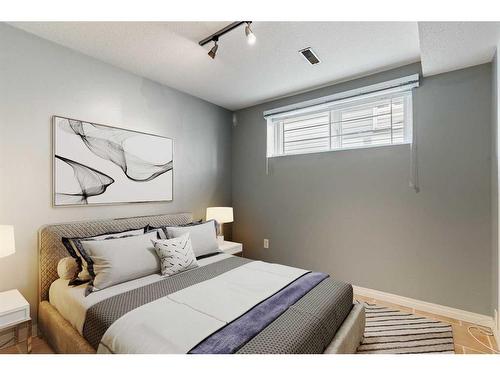 876 Mckenzie Drive Se, Calgary, AB - Indoor Photo Showing Bedroom