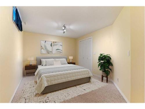 876 Mckenzie Drive Se, Calgary, AB - Indoor Photo Showing Bedroom