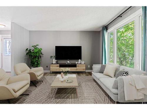 876 Mckenzie Drive Se, Calgary, AB - Indoor Photo Showing Living Room