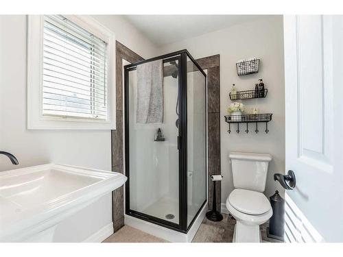 1107 Highland Green View Nw, High River, AB - Indoor Photo Showing Bathroom