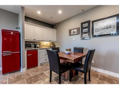 1107 Highland Green View Nw, High River, AB - Indoor Photo Showing Dining Room