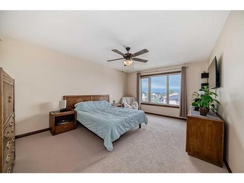 124 Aspenmere Close, Chestermere, AB - Indoor Photo Showing Bedroom