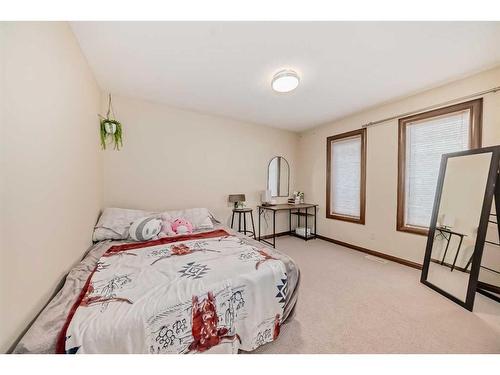 124 Aspenmere Close, Chestermere, AB - Indoor Photo Showing Bedroom