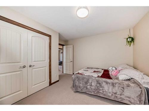 124 Aspenmere Close, Chestermere, AB - Indoor Photo Showing Bedroom