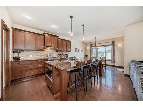 124 Aspenmere Close, Chestermere, AB - Indoor Photo Showing Kitchen With Upgraded Kitchen