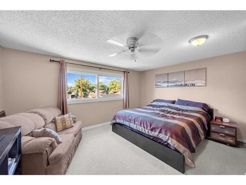 9 Mckenna Crescent Se, Calgary, AB - Indoor Photo Showing Bedroom