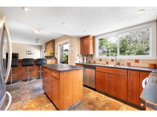 32 Deermont Road Se, Calgary, AB - Indoor Photo Showing Kitchen With Stainless Steel Kitchen With Double Sink