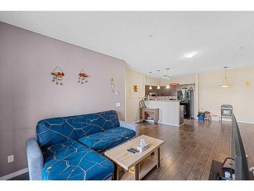 2306-1140 Taradale Drive Ne, Calgary, AB - Indoor Photo Showing Living Room