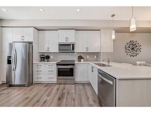 1633 Legacy Circle Se, Calgary, AB - Indoor Photo Showing Kitchen With Double Sink With Upgraded Kitchen