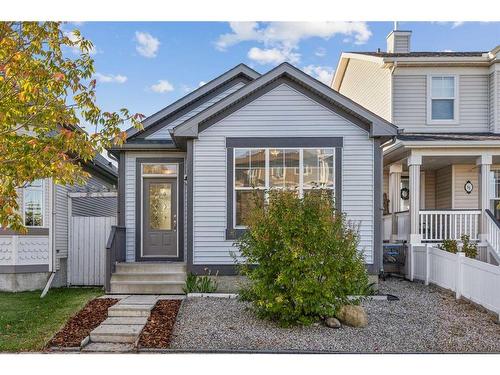 64 Prestwick Villas Se, Calgary, AB - Outdoor With Deck Patio Veranda With Facade