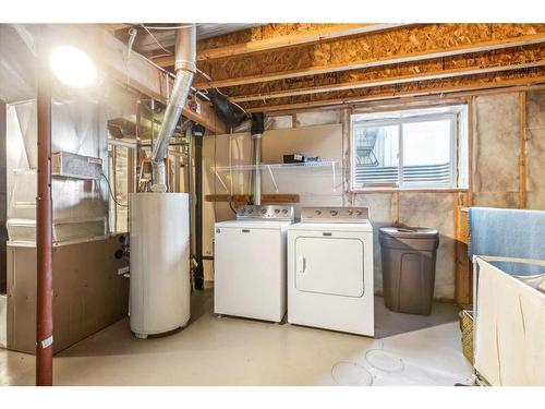 64 Prestwick Villas Se, Calgary, AB - Indoor Photo Showing Laundry Room